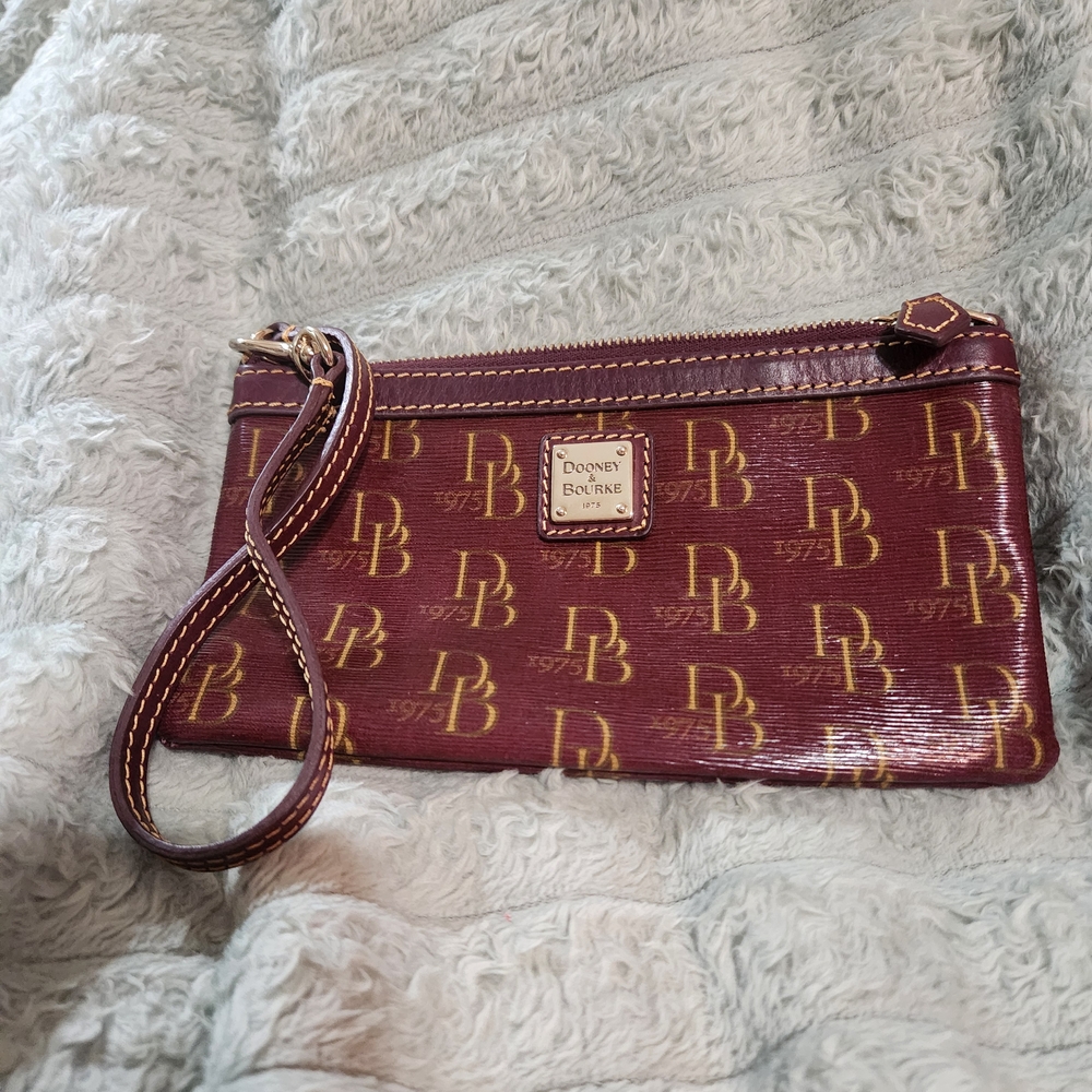Dooney & Bourke Burgandy Clutch Wristlet with Signature Monogram
